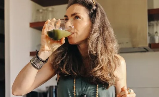 Woman drinking protein drink
