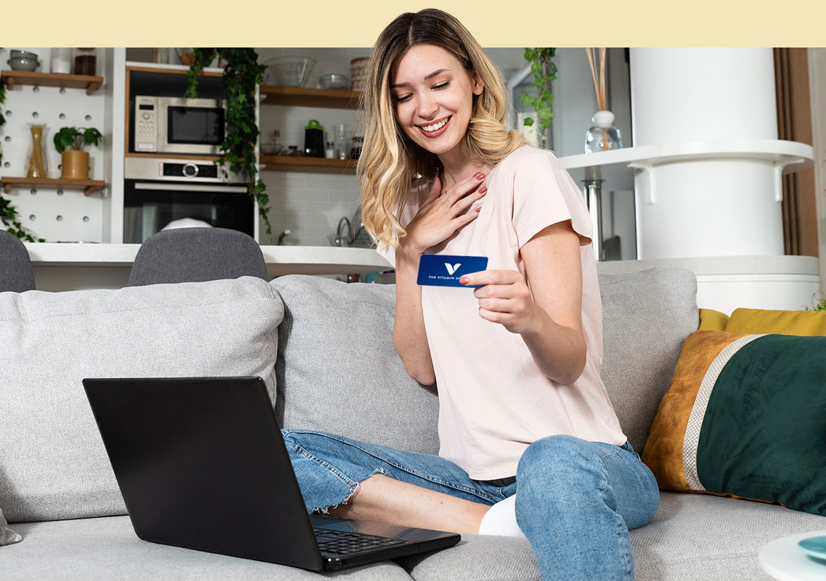 Woman using her Vitamin Shoppe Gift Card