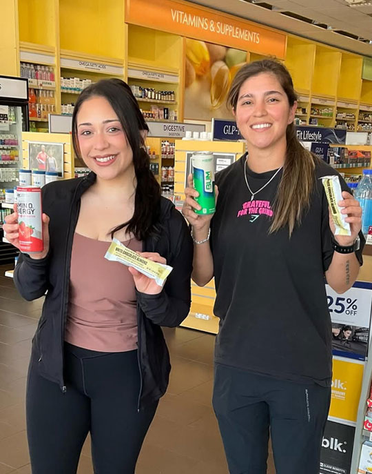 Miranda and Kandice from the Corpus Christi store holding some of their favorite products. Explore these products