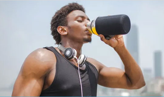 Man drinking Creatine